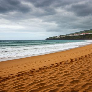 Rainy day on the beach in Terceira, Azores. The ocean is rough and there are big waves.